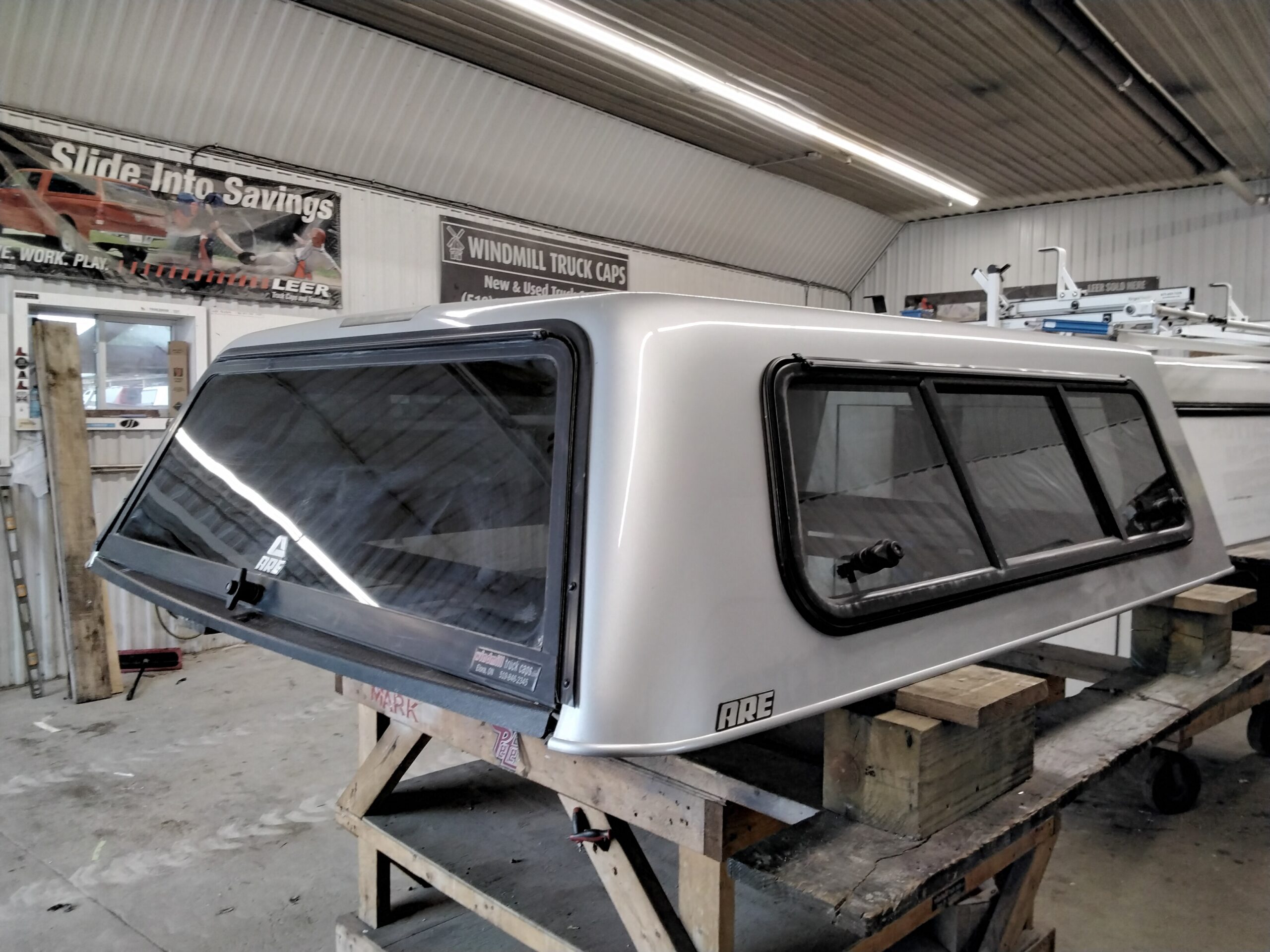 Chevrolet Silverado or GMC Sierra 6’6 GAN Silver ARE Truck Cap