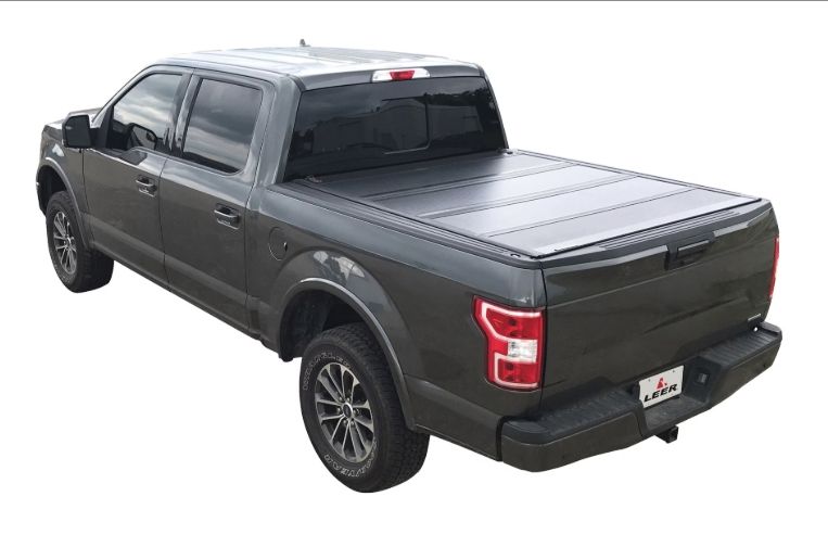 Dodge Ram 6’4 Leer 650M Flush Mount Quad Folding Tonneau Cover