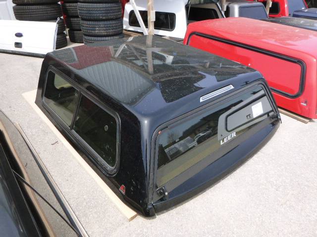 GMC Sierra 1500 6’6 New Black Leer 100S Truck cap